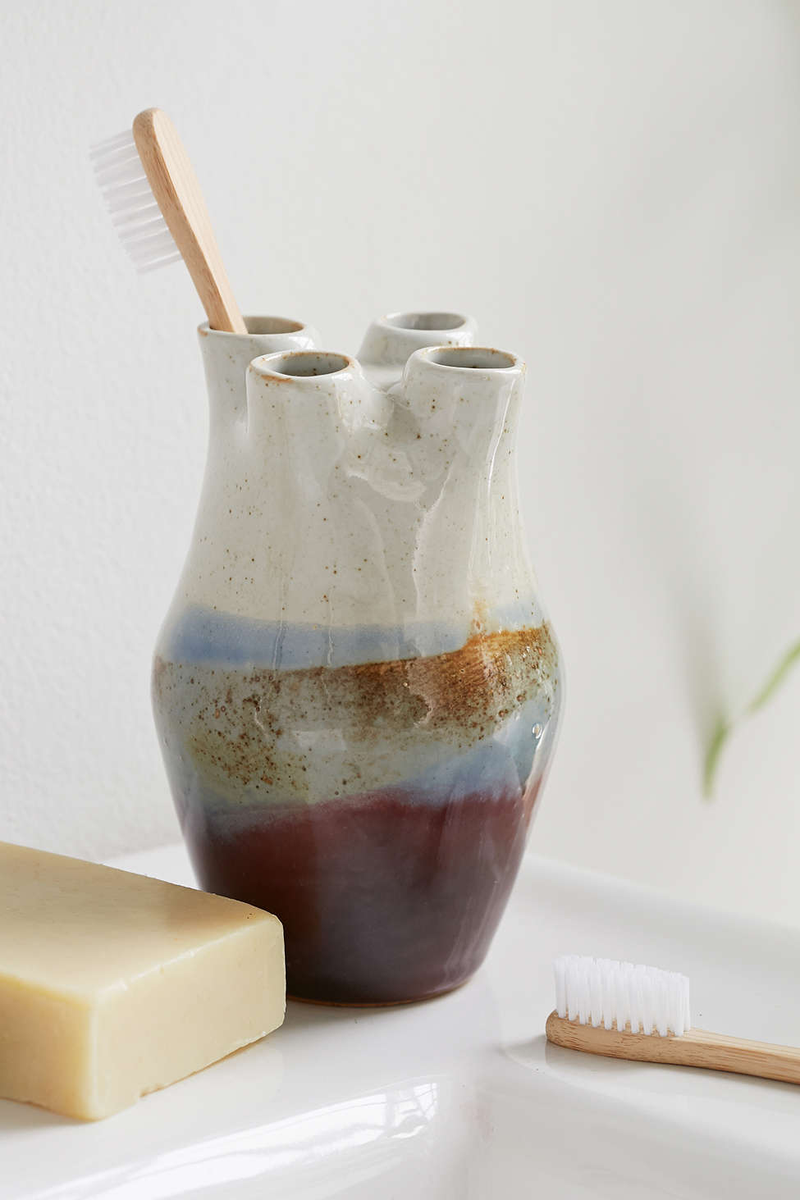 Magical Thinking Toothbrush Holder, $9.99 (was $29) Don't buy this! What, you thought I was serious? This shit is barftastic. Imagine what would grow inside and how you'd never be able to get it out (that is until it sprouted limbs and crawled out on its own).